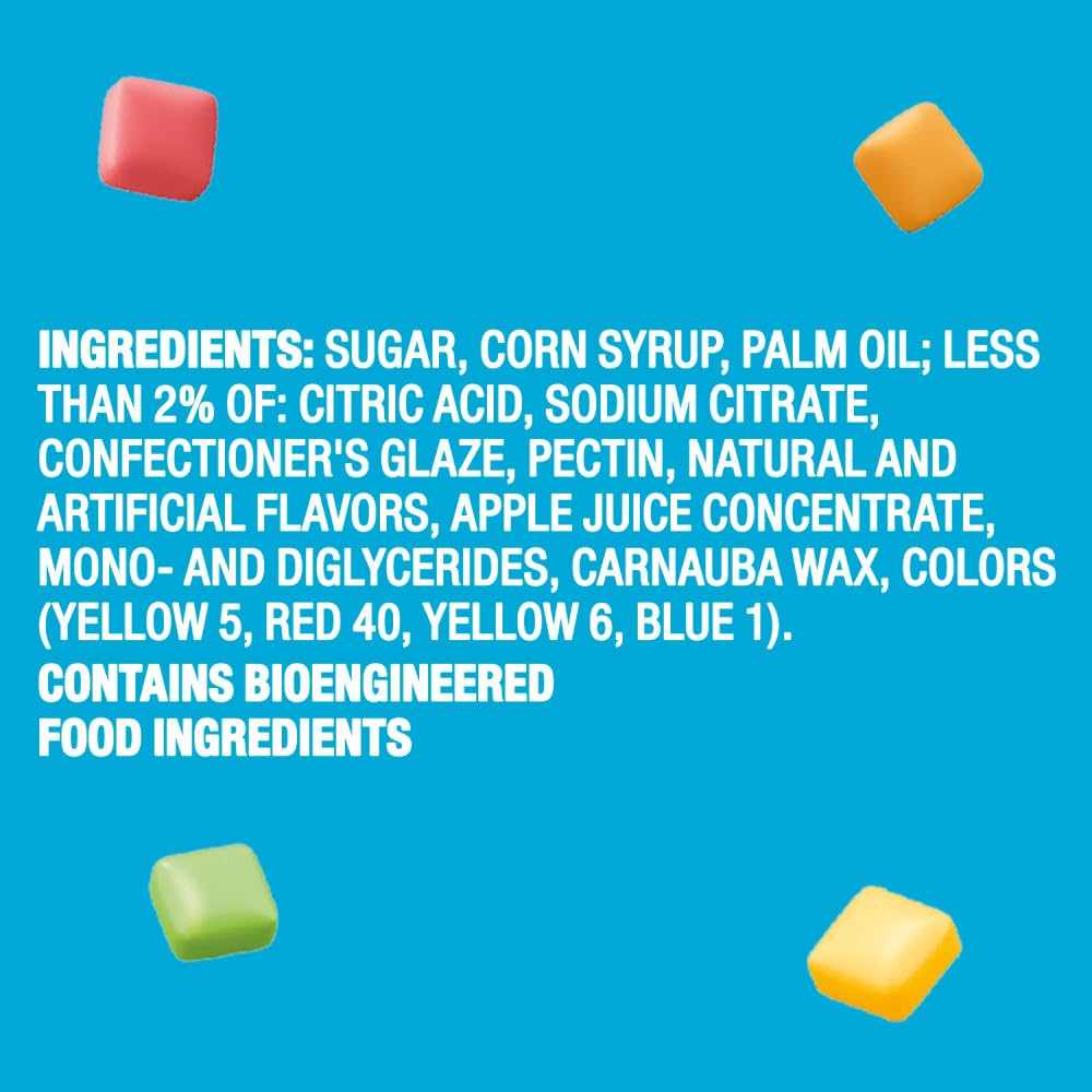 Starburst brand minis beside a coin and hand showing size and portion control
