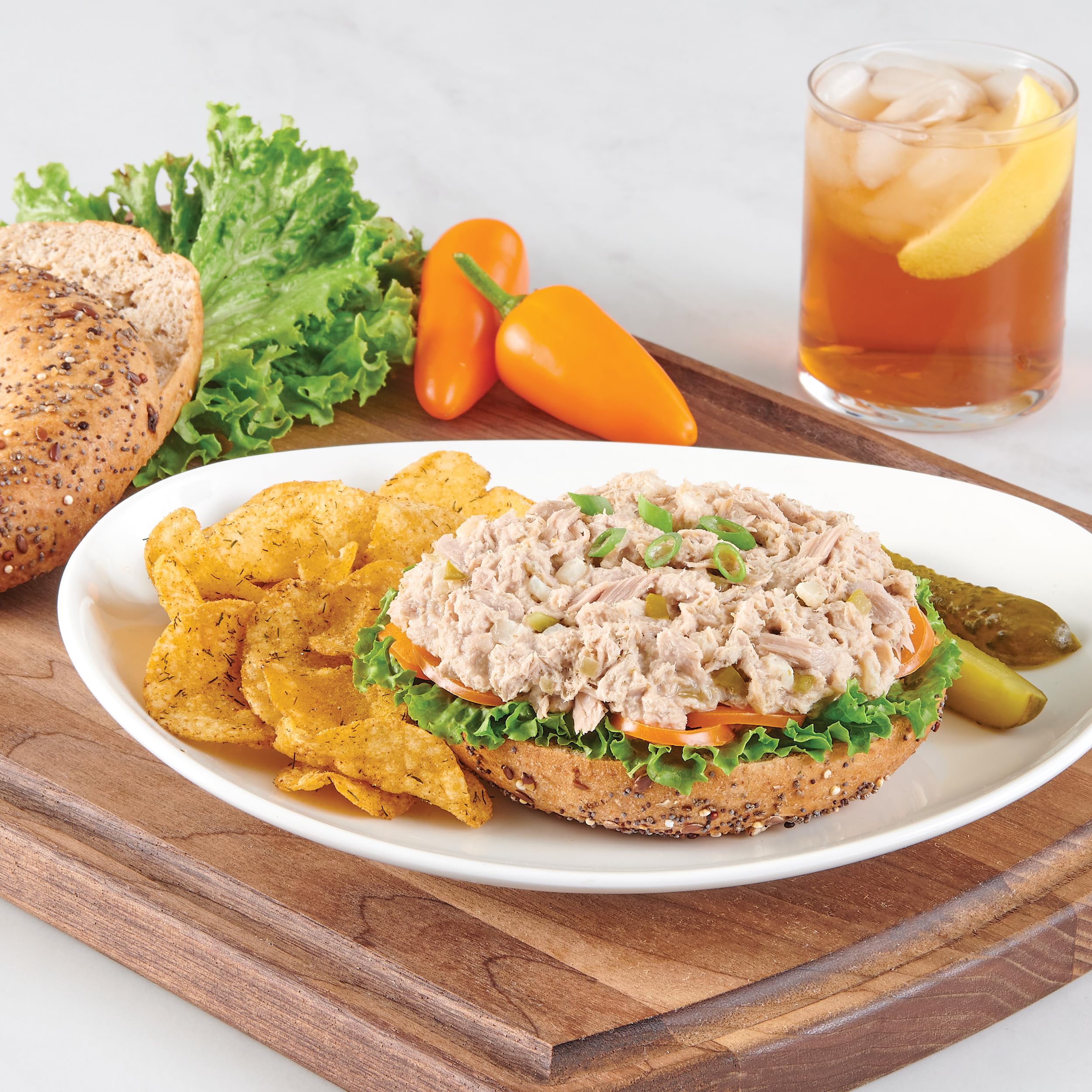 StarKist dill pickle tuna spooned over salad for bright flavor