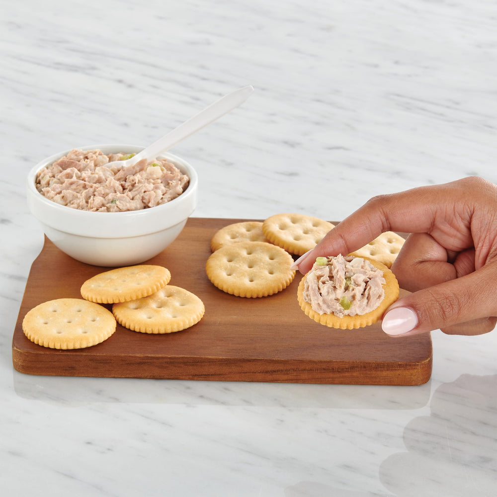 StarKist kit held in hand showing compact size for easy transport and travel-friendly design