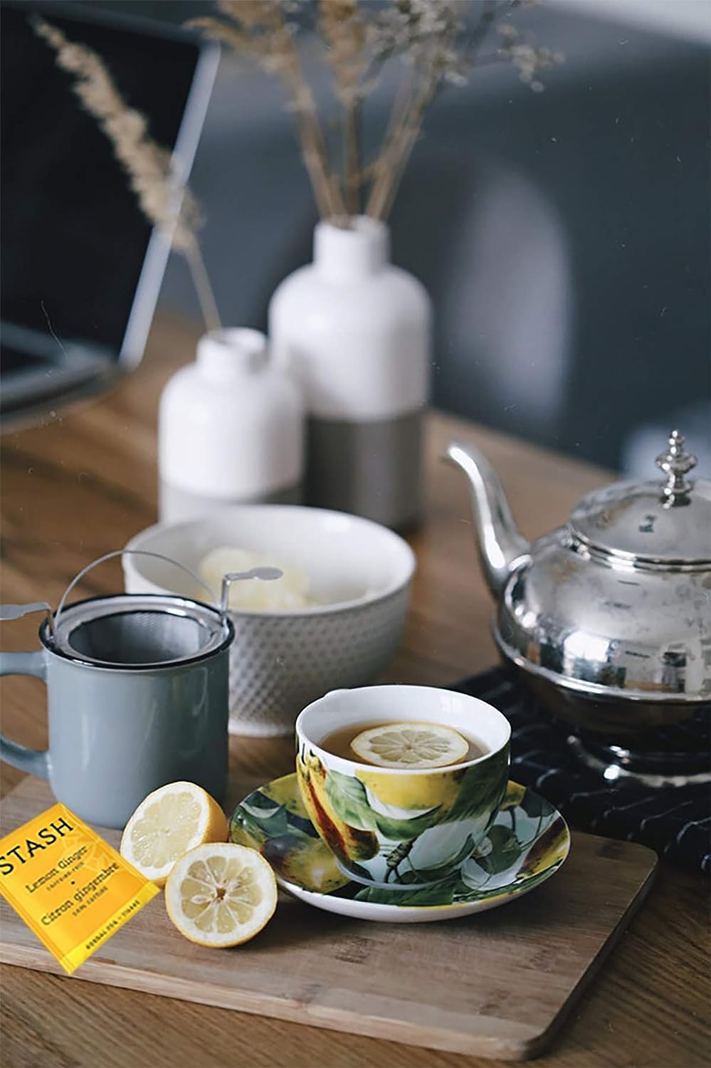 Stash cup with brewed tea being poured showcasing fresh flavor experience