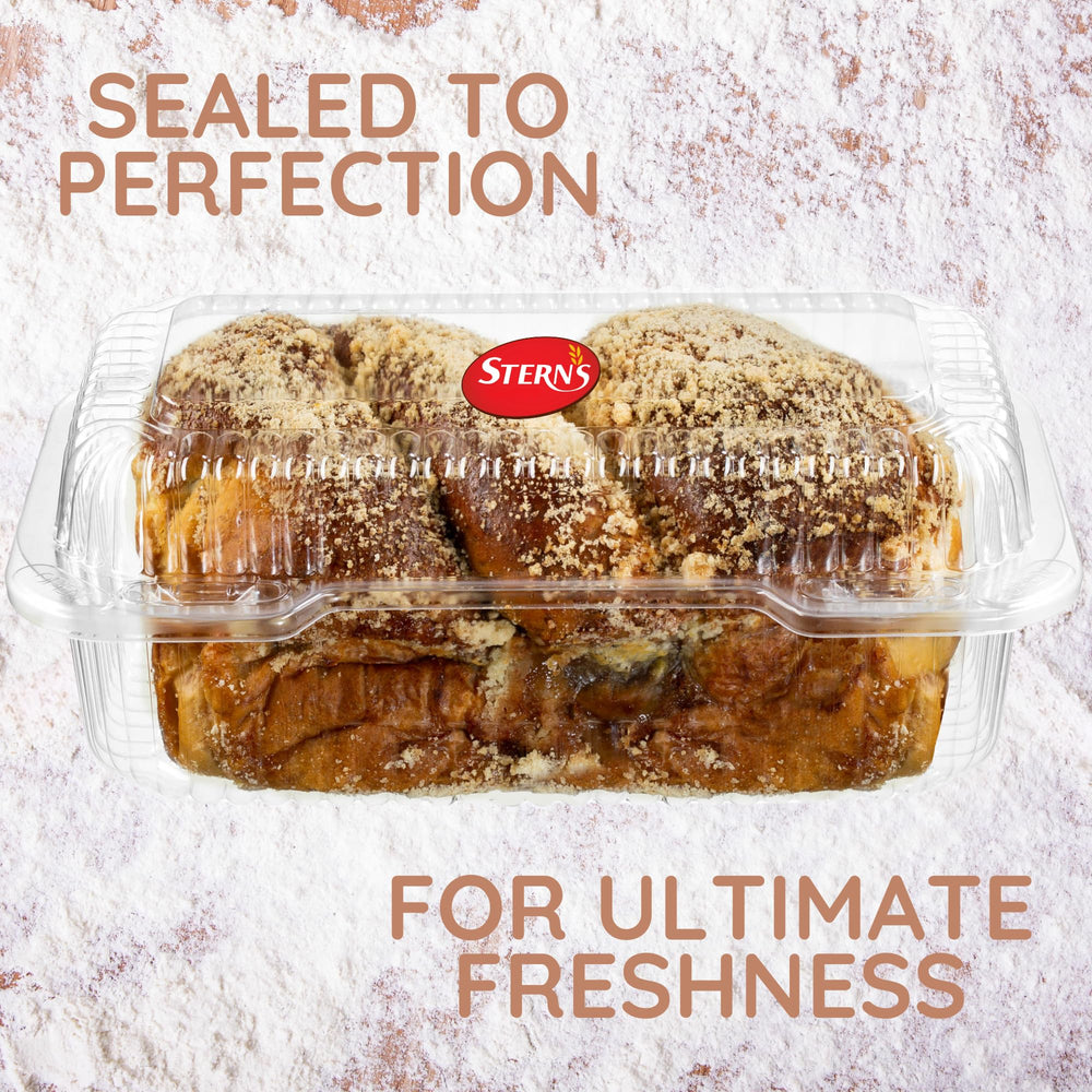 Stern's Bakery loaf being sliced to show portioning ease and freshness