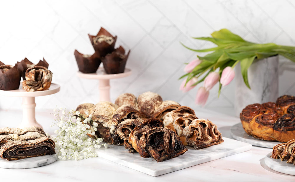 Stern's Bakery babka plated with coffee to suggest pairing and serving enjoyment