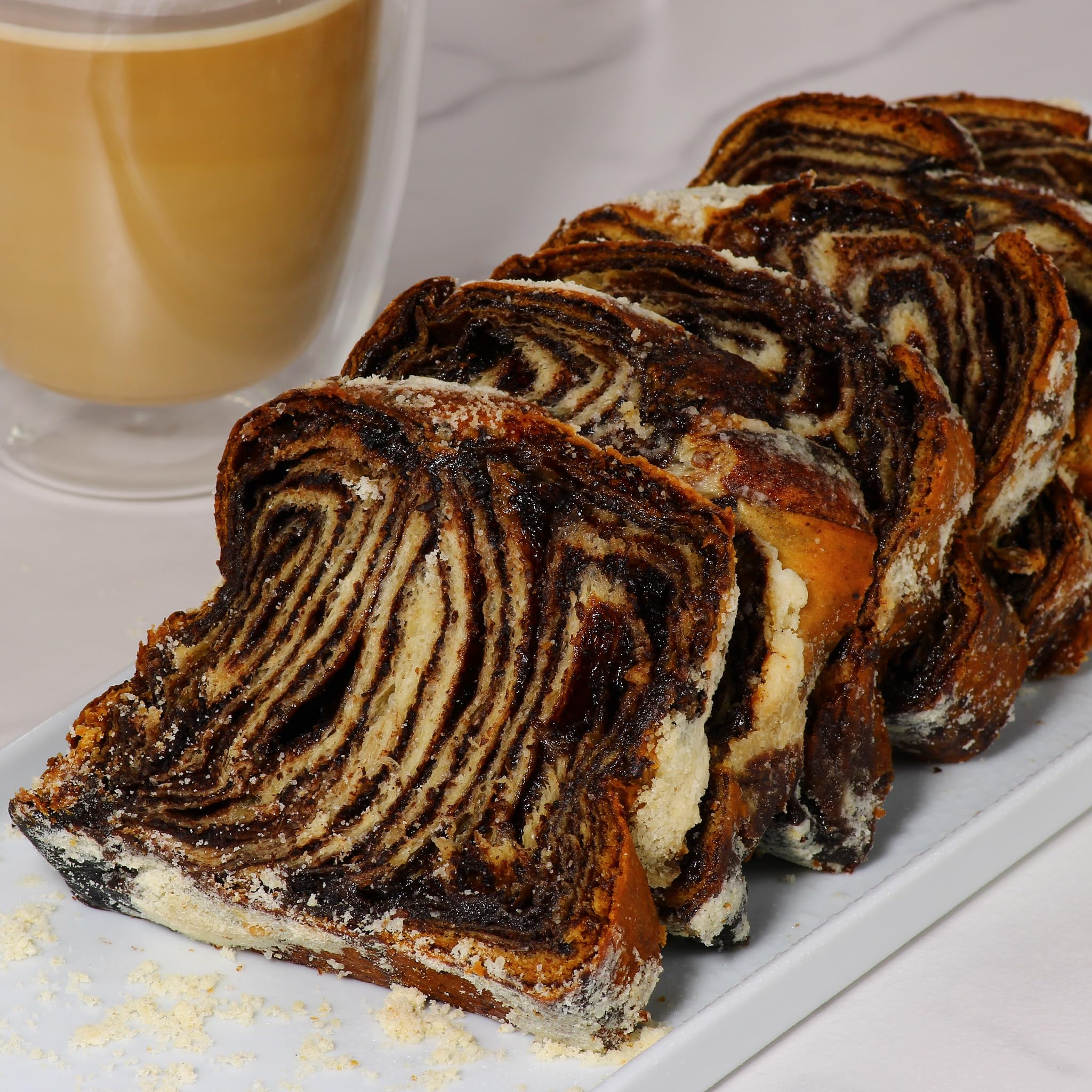 Stern's Bakery crumb texture shot showing soft interior and moisture retention benefits