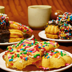 Stern's Bakery open tin with assorted cookies visible, showcasing variety and presentation