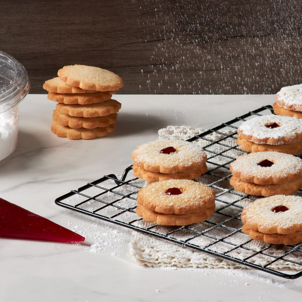 Stern's Bakery open tin displaying 18 cookies and reusable storage benefit