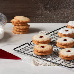 Stern's Bakery open tin displaying 18 cookies and reusable storage benefit