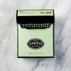 STEVEN SMITH TEAMAKER dry leaf blend close-up displaying Mao Feng, mint, lemon myrtle aroma