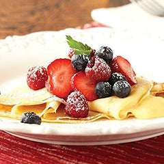 Stonewall Kitchen crepe filled with strawberries demonstrating fresh fruit pairing and visual appeal