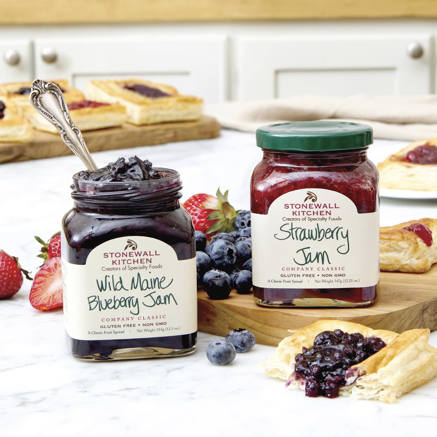 Stonewall Kitchen jam duo arranged on cheese board adding sweet-savory contrast