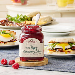 Stonewall Kitchen jar open with spoon demonstrating spreadability benefit