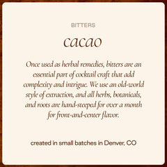 Dash of Strongwater Cacao Bitters falling into a mixing glass for richer aroma