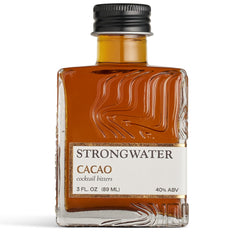 Strongwater bottle front view showing cacao bitters and bar-ready presentation