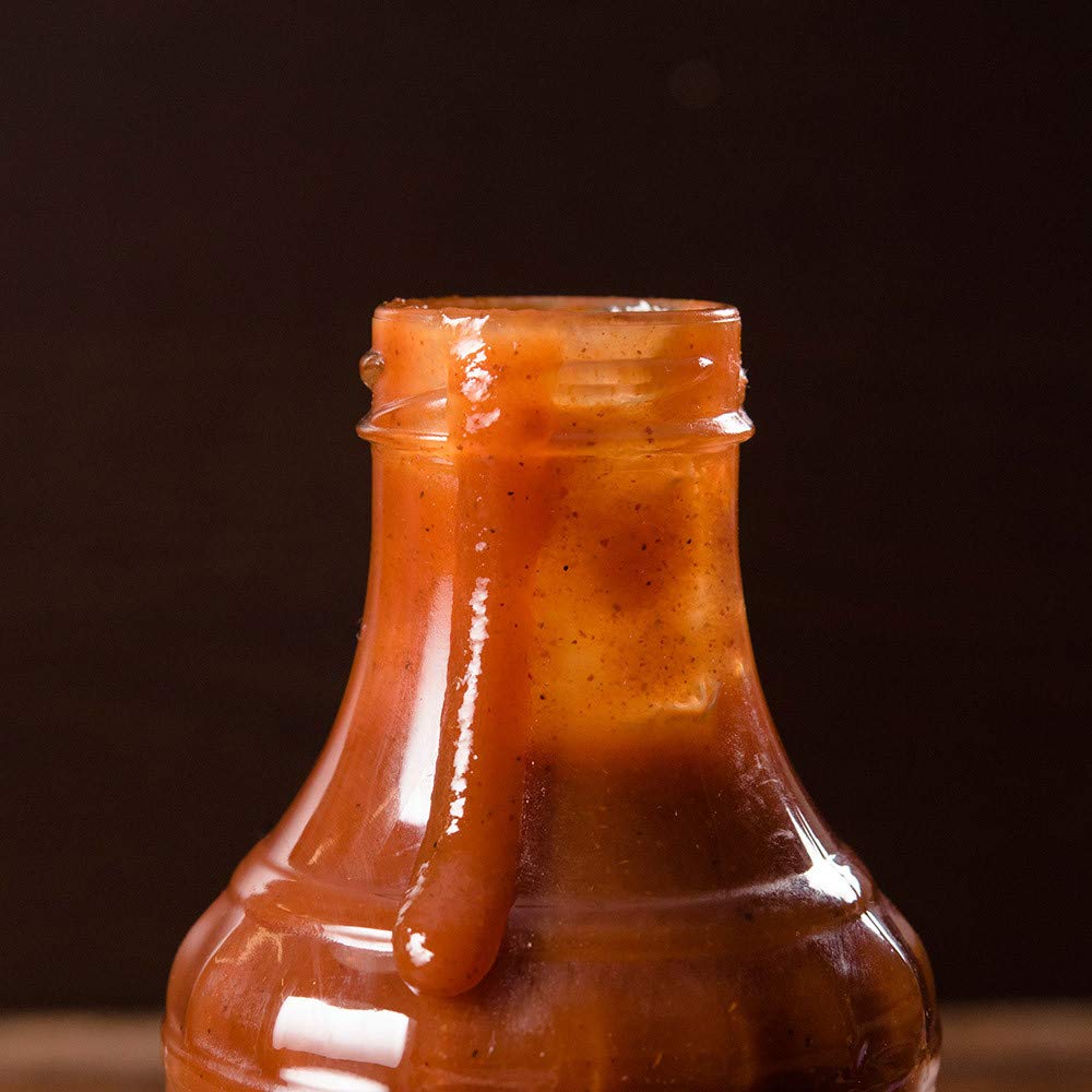 Stubb's bottle alongside brown sugar and molasses illustrating ingredients