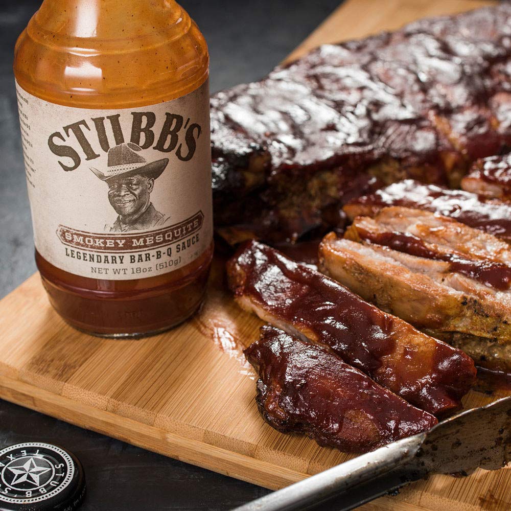 Thick pour of Stubb's sauce showing glossy texture and caramelized sheen