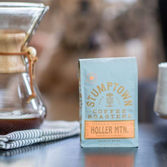 Stumptown beans being ground and brewed showcasing versatility and flavor