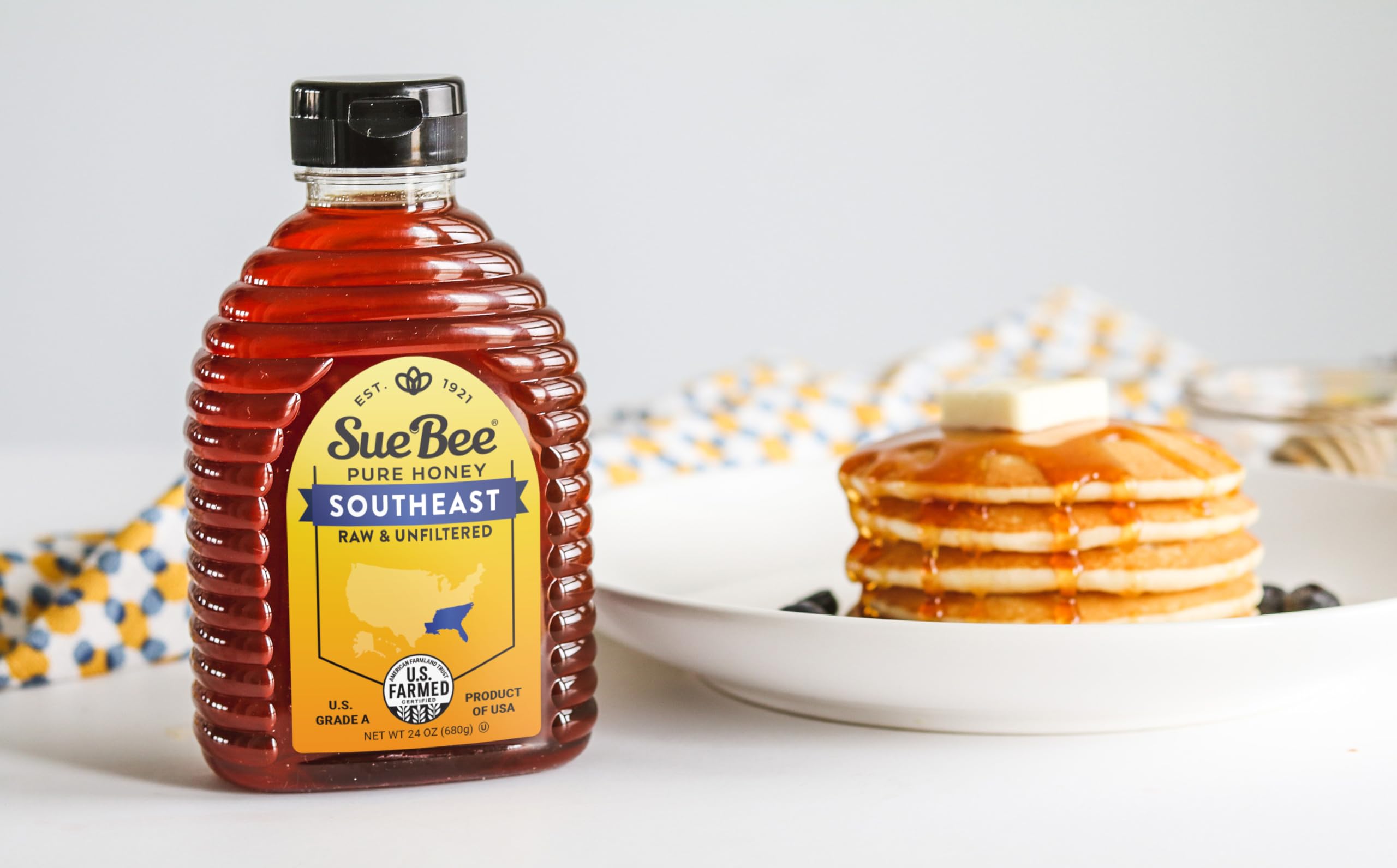 Sue Bee honey being poured into a teacup adding natural sweetness and flavor benefit