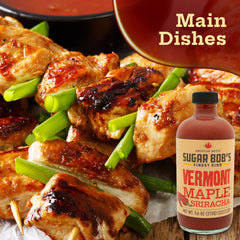 Sugar Bob's pouring maple sriracha from bottle to show thick consistency and glossy finish