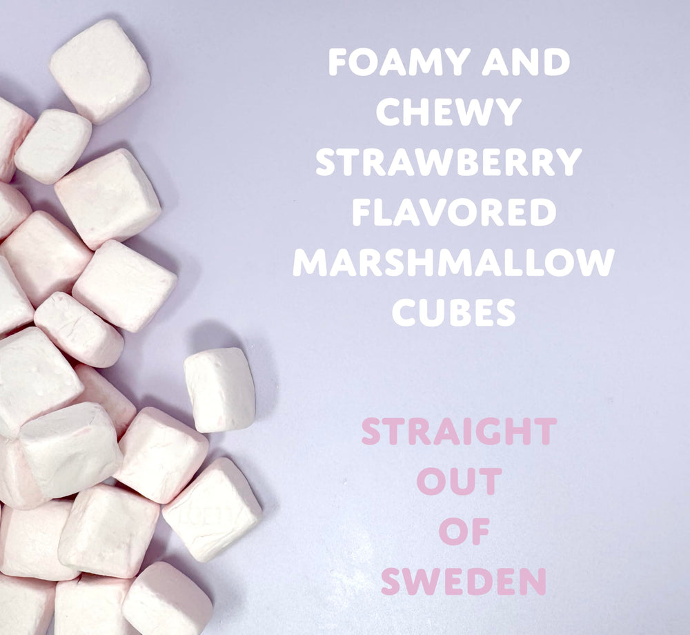 Sugarloo World close-up of strawberry marshmallow cube texture, highlighting airy softness