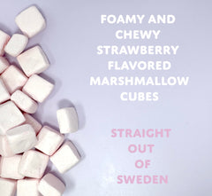 Sugarloo World close-up of strawberry marshmallow cube texture, highlighting airy softness