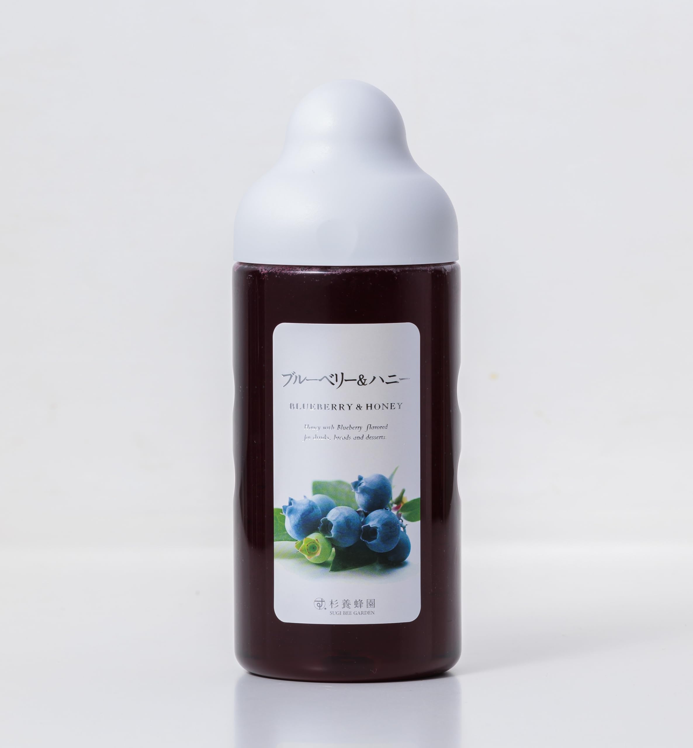 杉養蜂園 Sugi Bee Garden jar front view showing label and rich blueberry-honey color, ideal for gifting