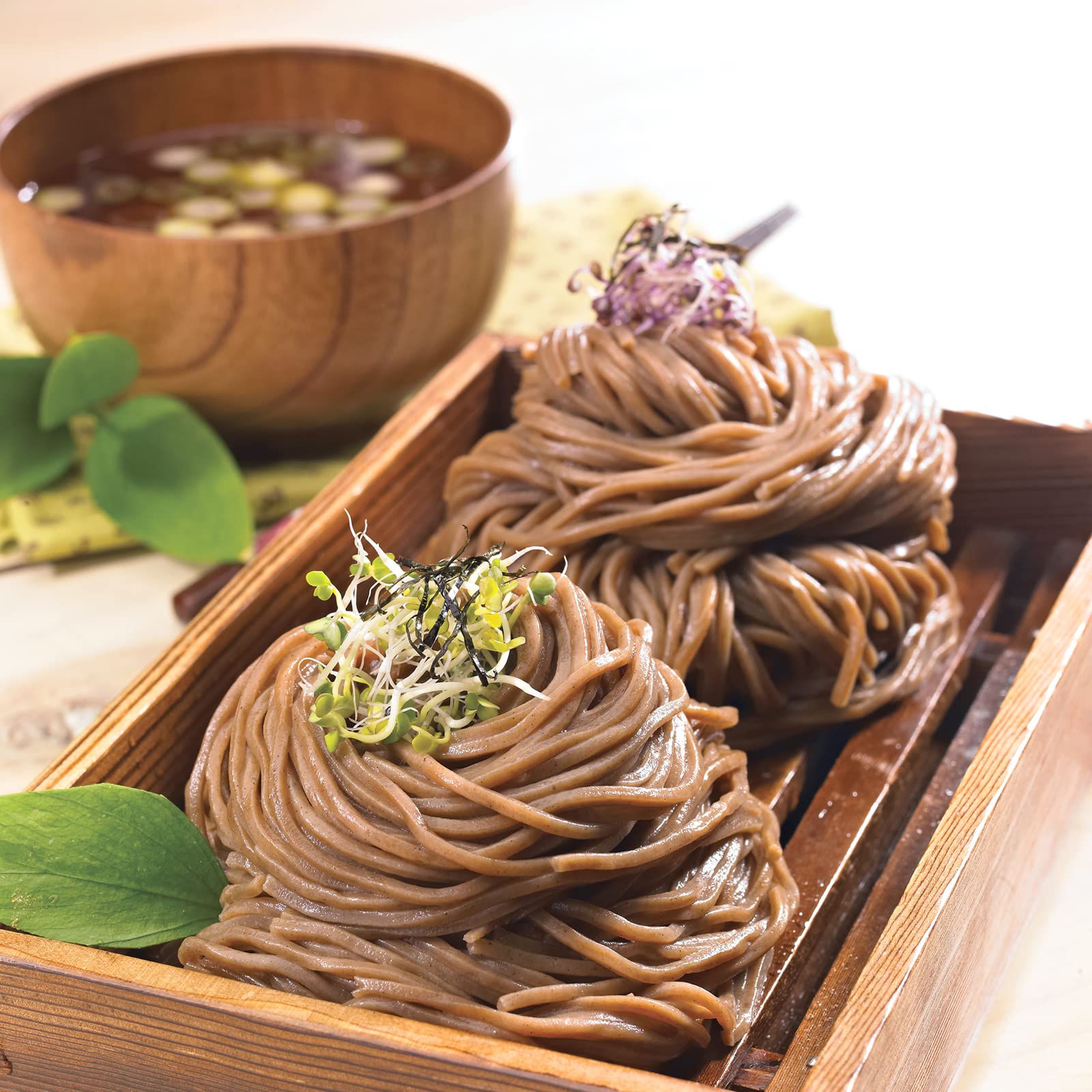 SUKINA plated noodles in kitchen lifestyle shot showing family meal appeal