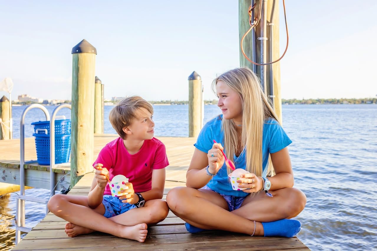 Sunshine Sno pouch at a picnic table showing portable summer party use