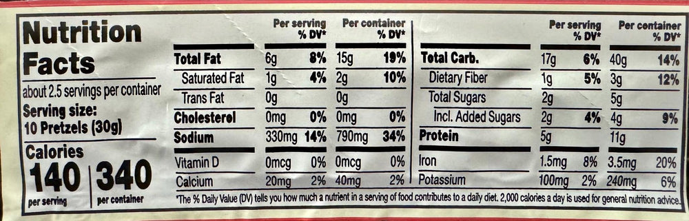 SUPERDEALS single 2.5oz HK Anderson bag held in hand to show scale and grab-and-go convenience