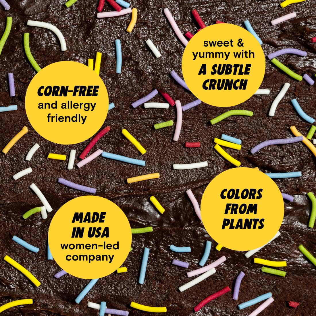 Supernatural rainbow crunchies jar open with sprinkles spilling, shows vibrant plant-based colors