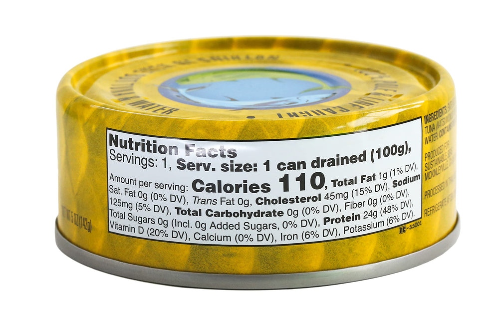 Sustainable Seas open can with visible flaky tuna in water demonstrating fresh texture