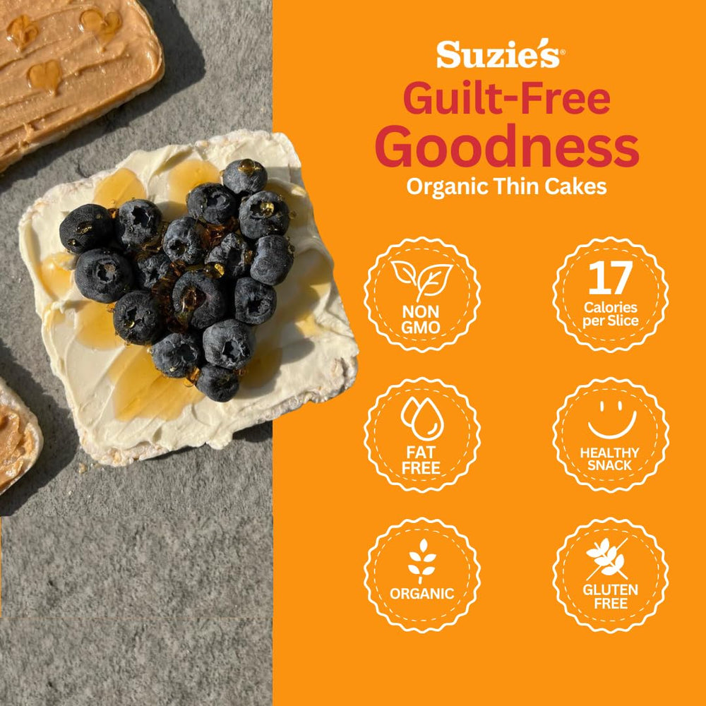SUZIE'S corn cake thin held in hand to show size and portion control benefit