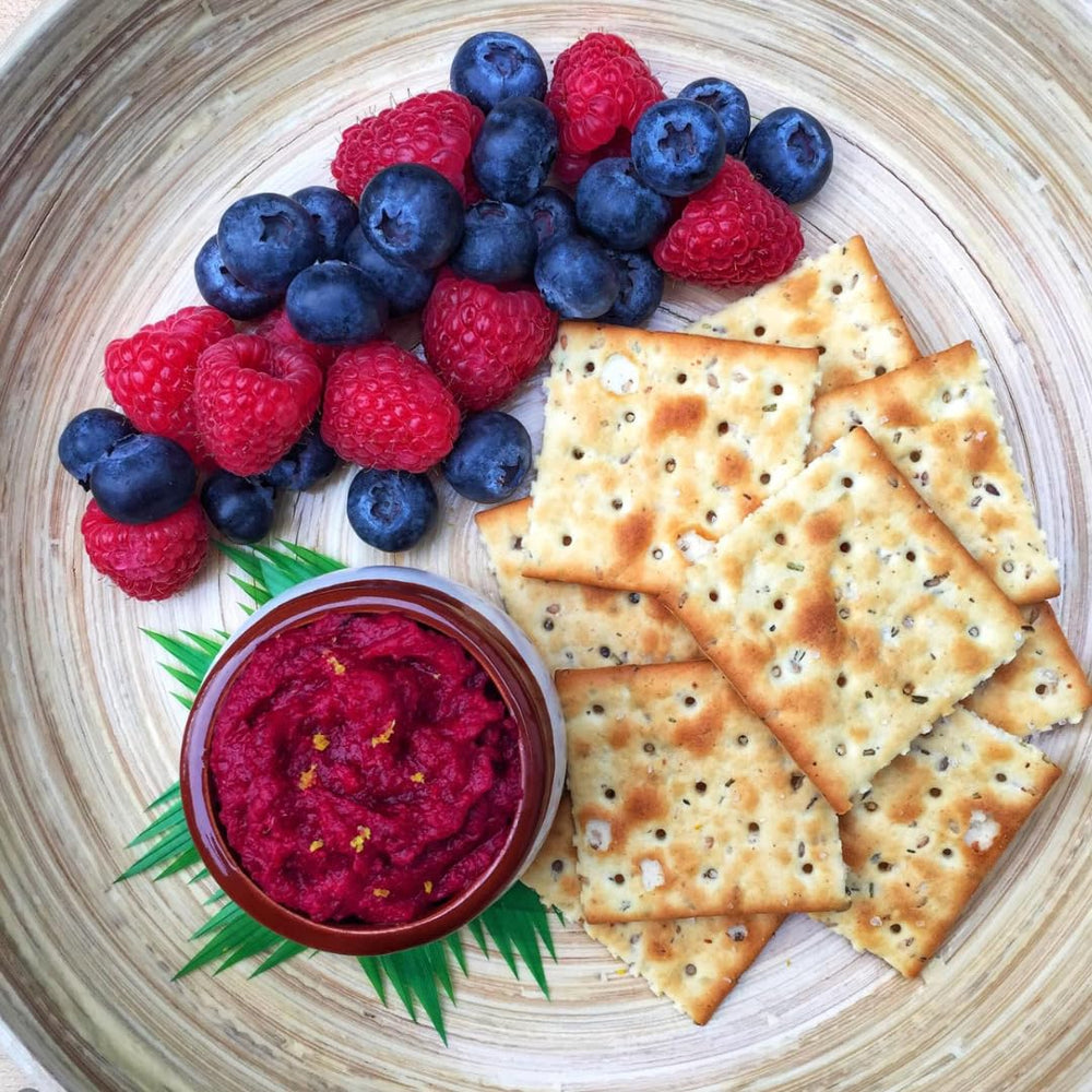 SUZIE'S ingredient bowls displaying organic wheat and olive oil for clean-label transparency