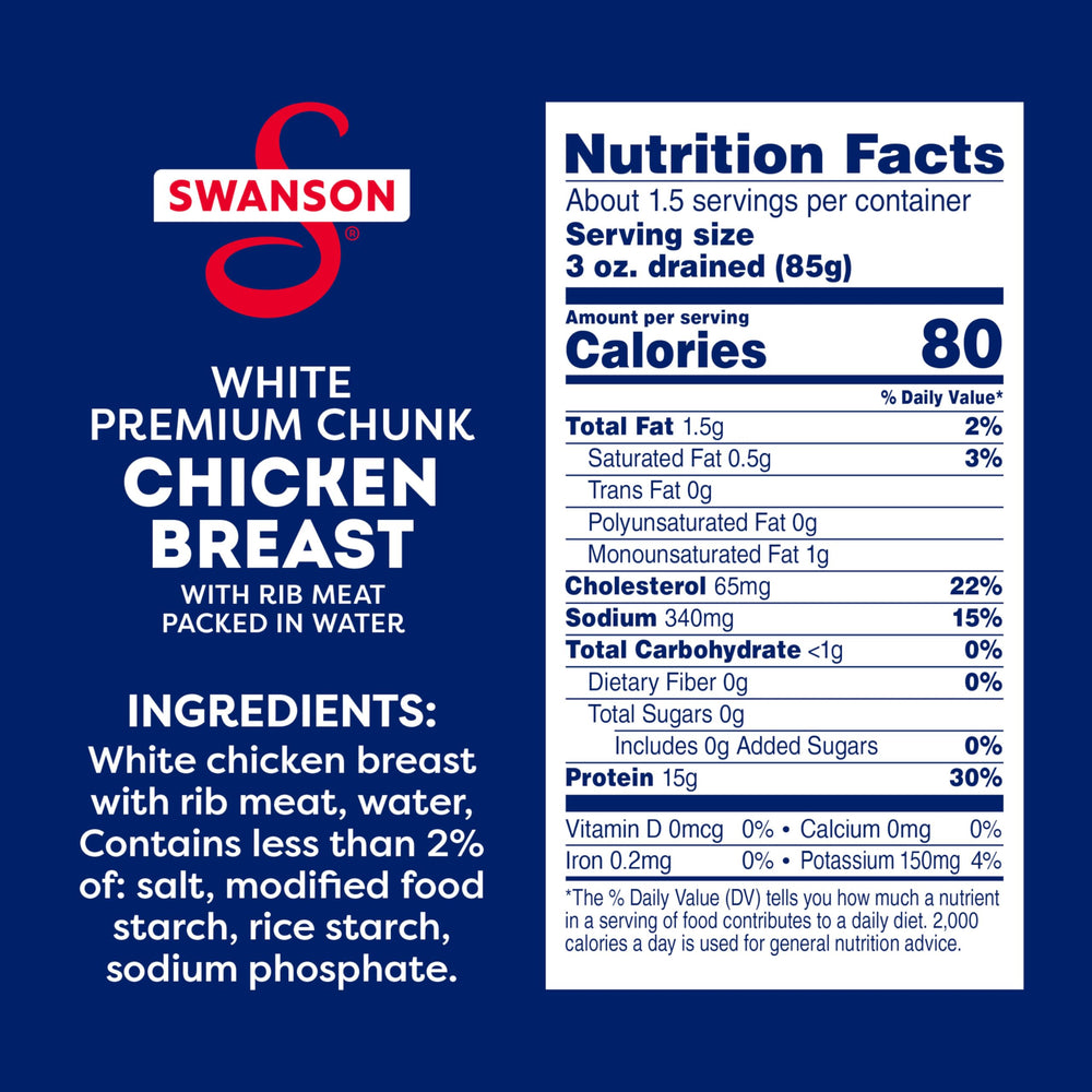 SWANSON S open can revealing white chicken chunks ready to eat and convenient