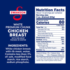 SWANSON S open can revealing white chicken chunks ready to eat and convenient