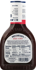 Sweet Baby Ray's pouring Hickory & Brown Sugar sauce over grilled meat
