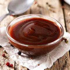Sweet Baby Ray's sauce close-up highlighting thick texture and cling for better coating