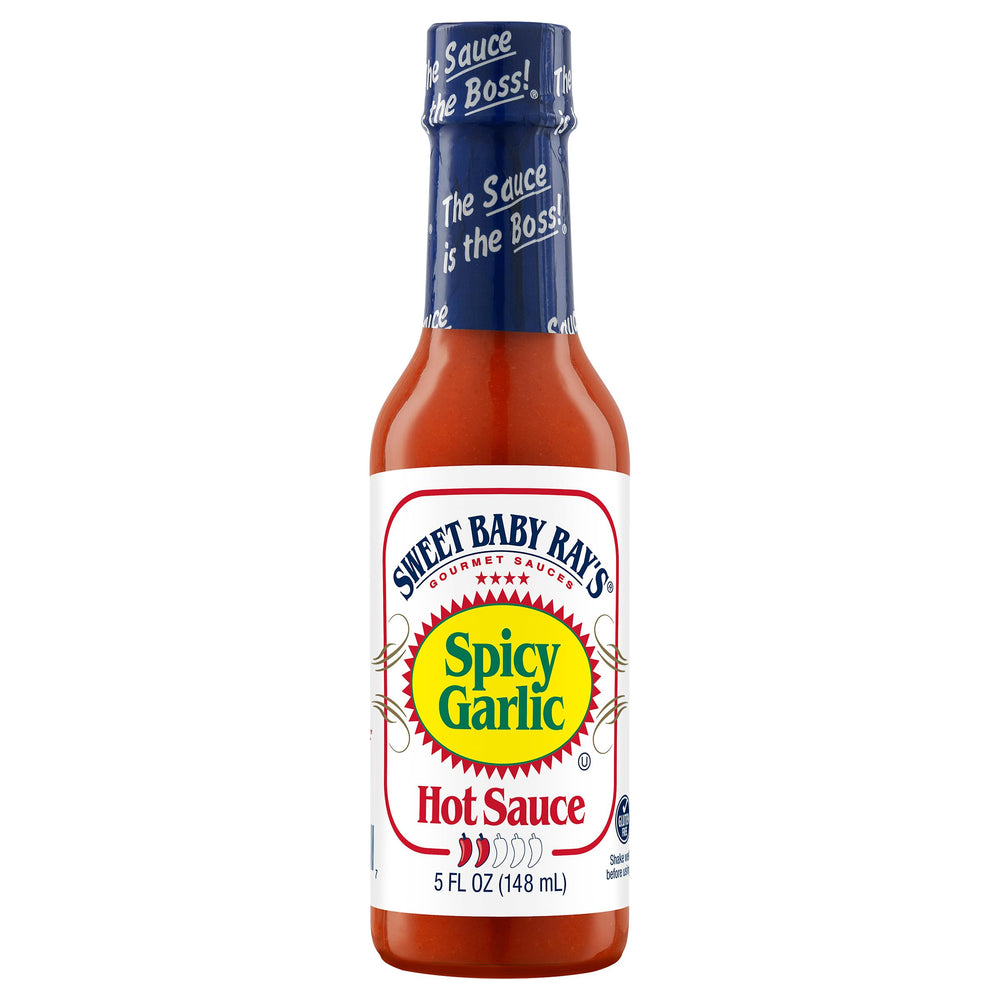 Sweet Baby Ray's sauce pouring from bottle highlighting easy controlled pour and flavor