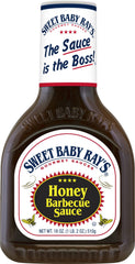 Sweet Baby Ray's Sweet 'n Spicy pouring onto ribs showing sticky glaze and bold flavor