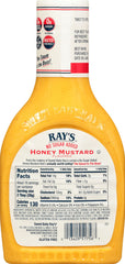 Sweet Baby Ray's Sweet & Smoky bottle beside grill suggesting smoky flavor