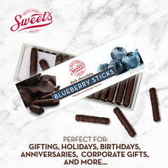 Sweet Candy Company sticks in hand to show scale and portion-friendly serving
