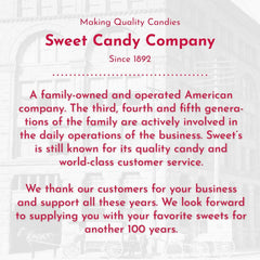 Sweet Candy Company taffy in a glass jar at a party table — attractive candy buffet presentation