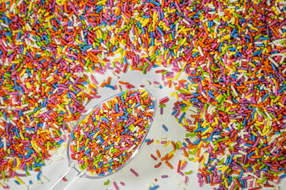 Sweet Eva’s spoonful of sprinkles showing portion control and quick decorating convenience