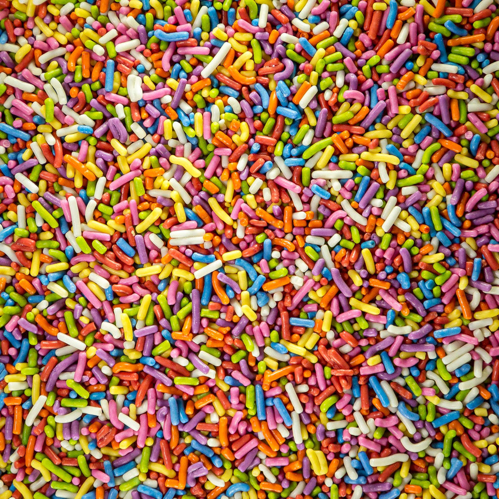 Sweet Eva’s sprinkles on a frosted cupcake adding vibrant color and party-ready appeal