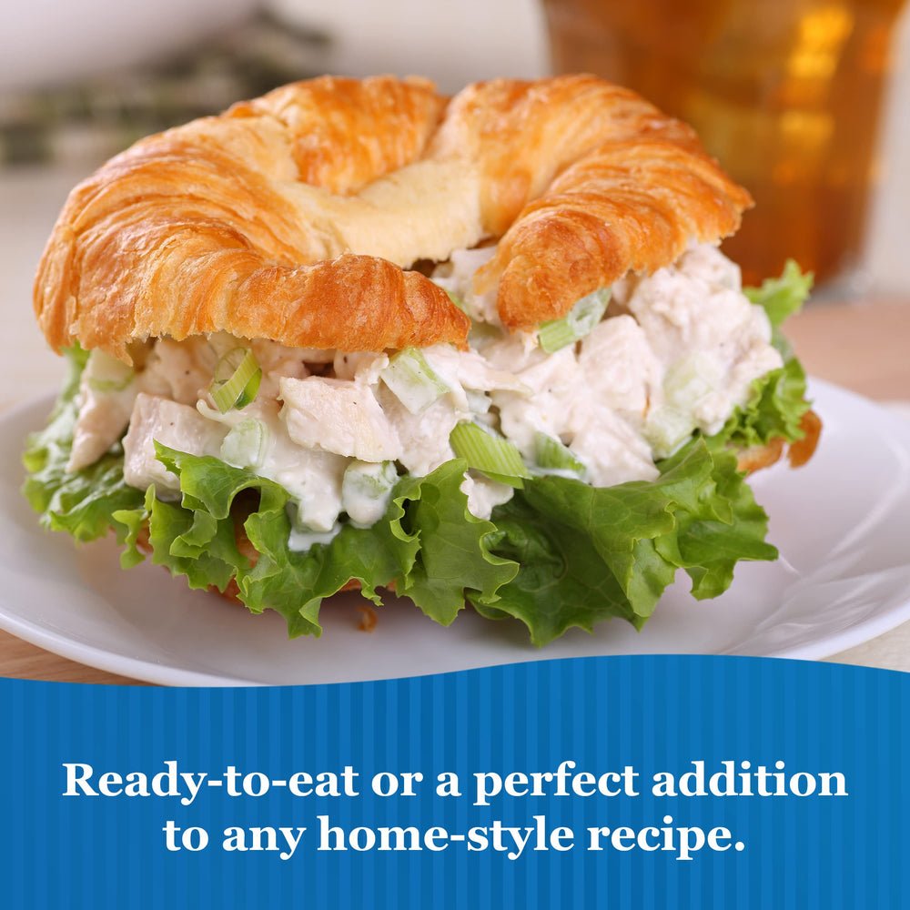 Sweet Sue pouch poured over salad showing quick meal convenience