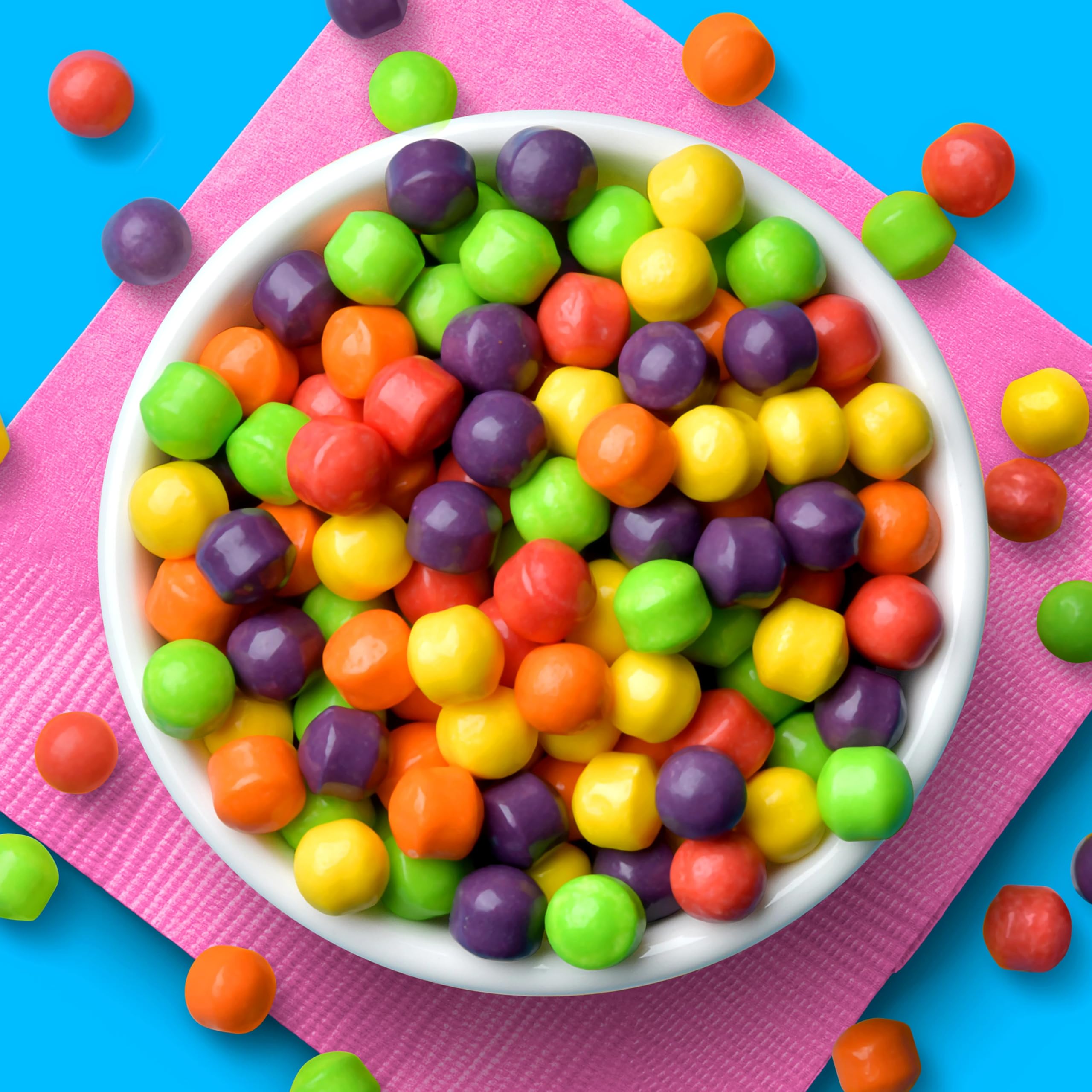 Arrangement of five SweeTARTS flavors showing variety and bright color appeal