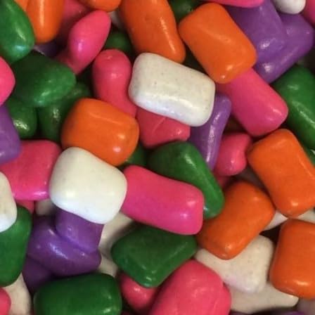 SweetGlob handful next to a hand for size comparison illustrating portion and serving suggestion