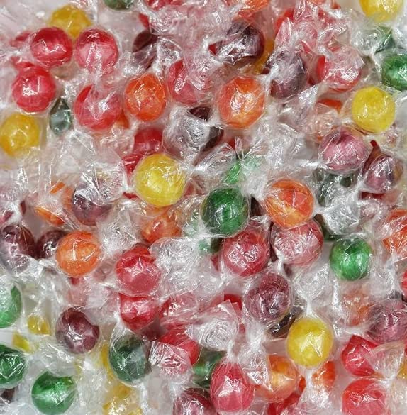 SweetGlob close-up of sour fruit ball surface texture highlighting vivid color and tangy appeal