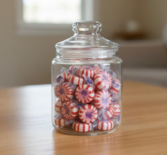 SweetGlob mint held in hand to show actual size and convenient portability