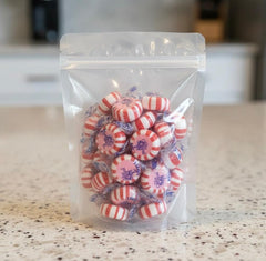 SweetGlob individually wrapped mints spread on table for hygienic sharing