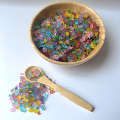 SweetGlob sugar gem stirring in tea demonstrating gradual sweetening benefit