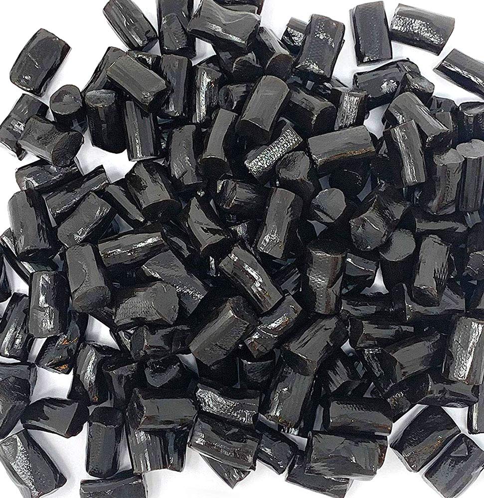 SweetGourmet close-up of soft black licorice bites highlighting chewy texture benefit